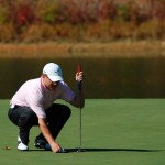 Lining up the put at David Weathers Celebrity Golf Tournament